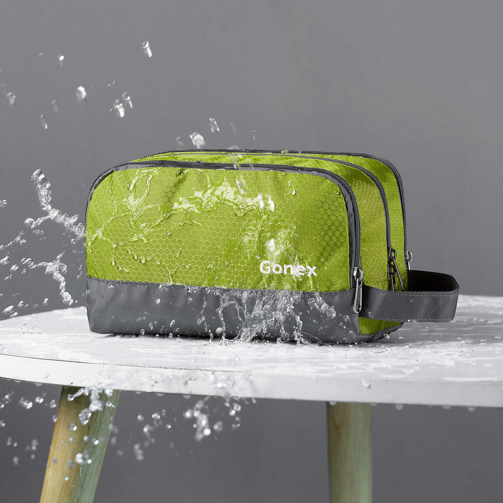 Gonex bolsa de aseo verde, bolsillo de malla para artículos pequeños y visibilidad.