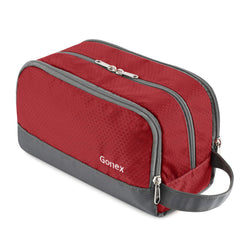 Bolsa de aseo Gonex roja, vista frontal, ideal para organizar artículos de aseo en viaje.
