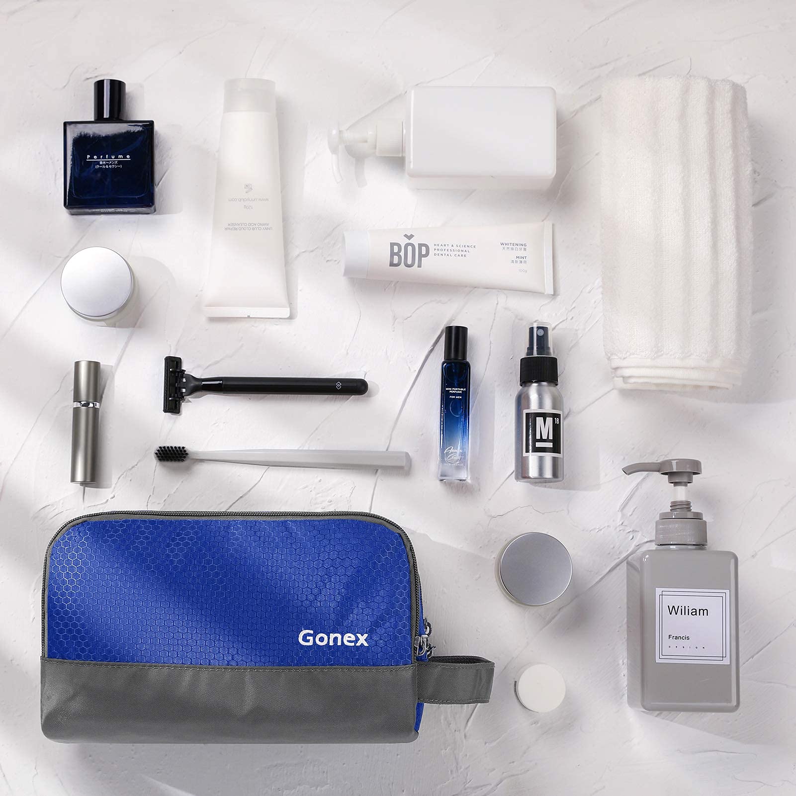 Gonex bolsa de aseo multifuncional con bolsillos para todo en su lugar.