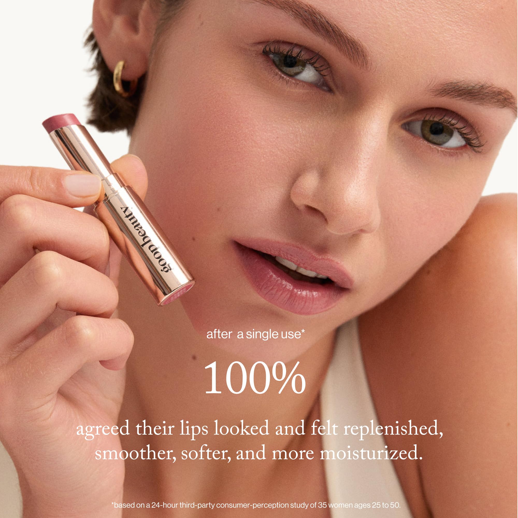 Goop Beauty Tinted Lip Balm on lips shows subtle color and hydration.