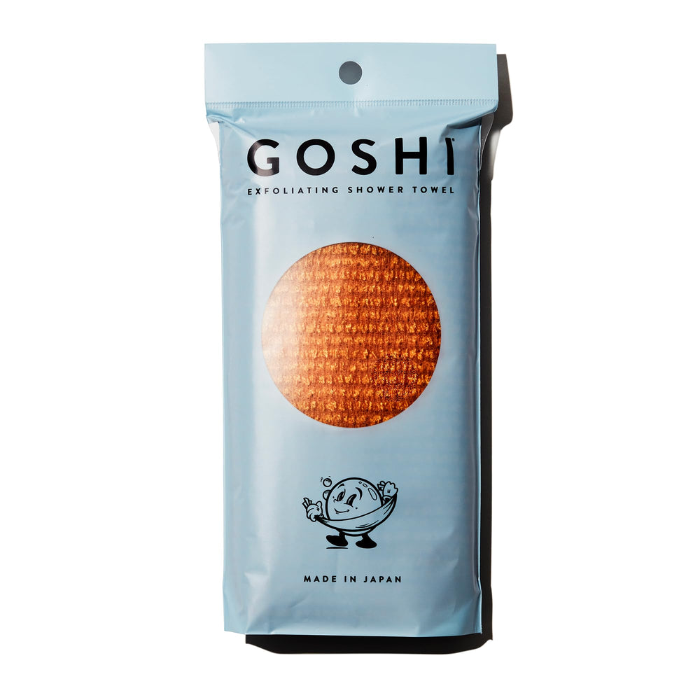 Toalla exfoliante GOSHI de color amarillo calendula, ideal para exfoliar suavemente la piel.