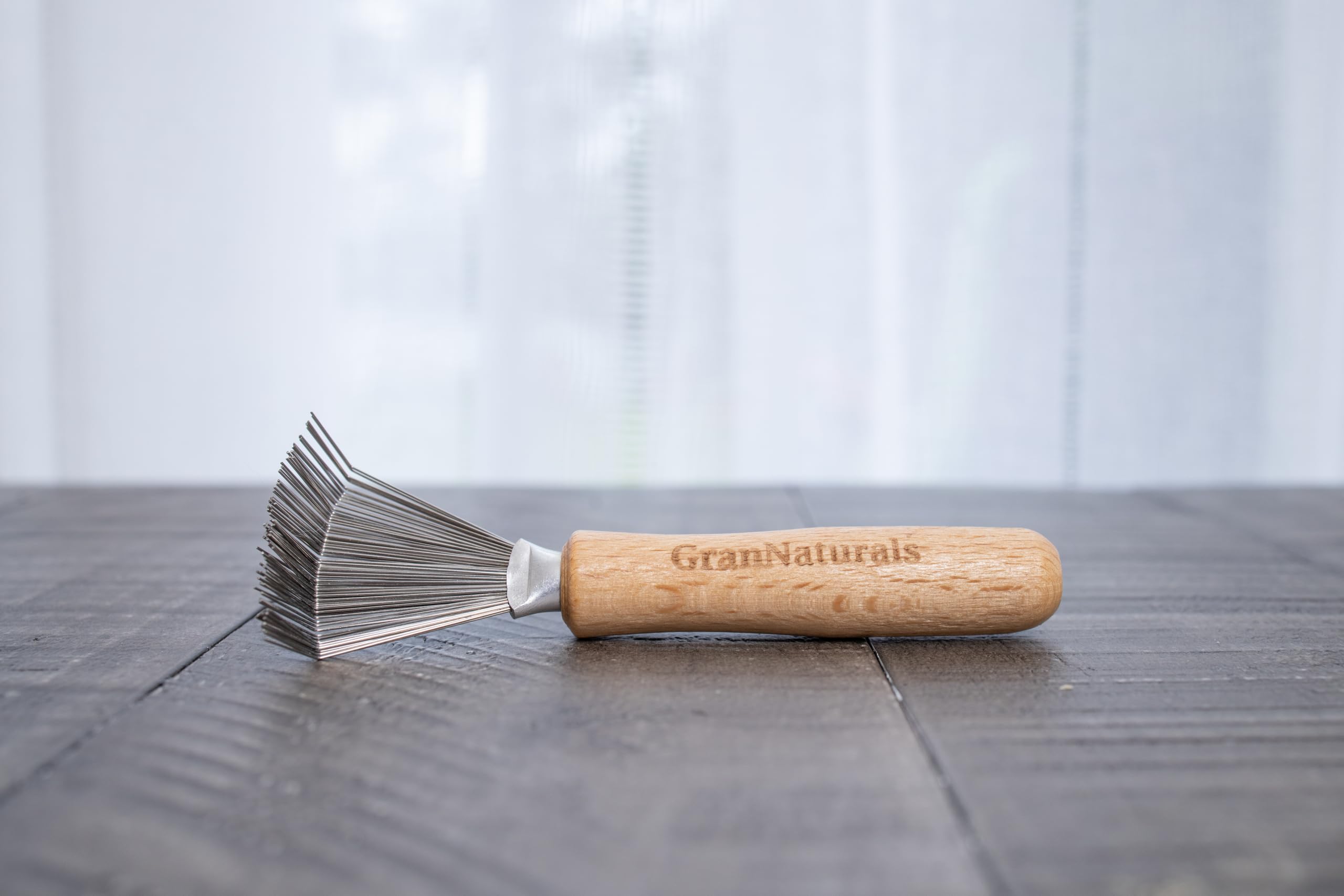 Dientes metalicos duraderos GranNaturals para quitar suciedad rebelde