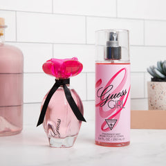 GUESS Girl heart-notes visual with orchid and lily for romantic moments