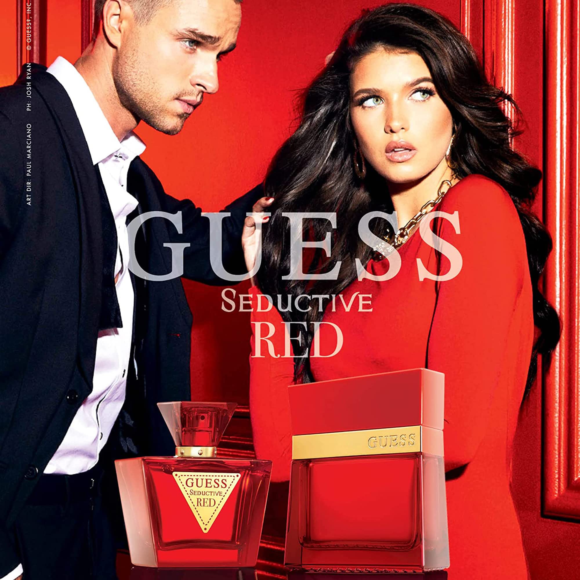GUESS Seductivo Rojo para hombre, detalle de etiqueta, captura la esencia oriental picante.