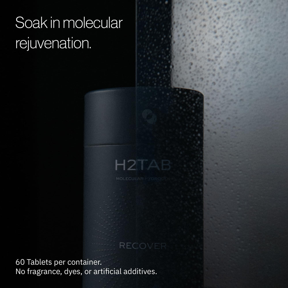 Tableta H2TAB con base de magnesio liberando burbujas de hidrógeno para recuperación muscular.