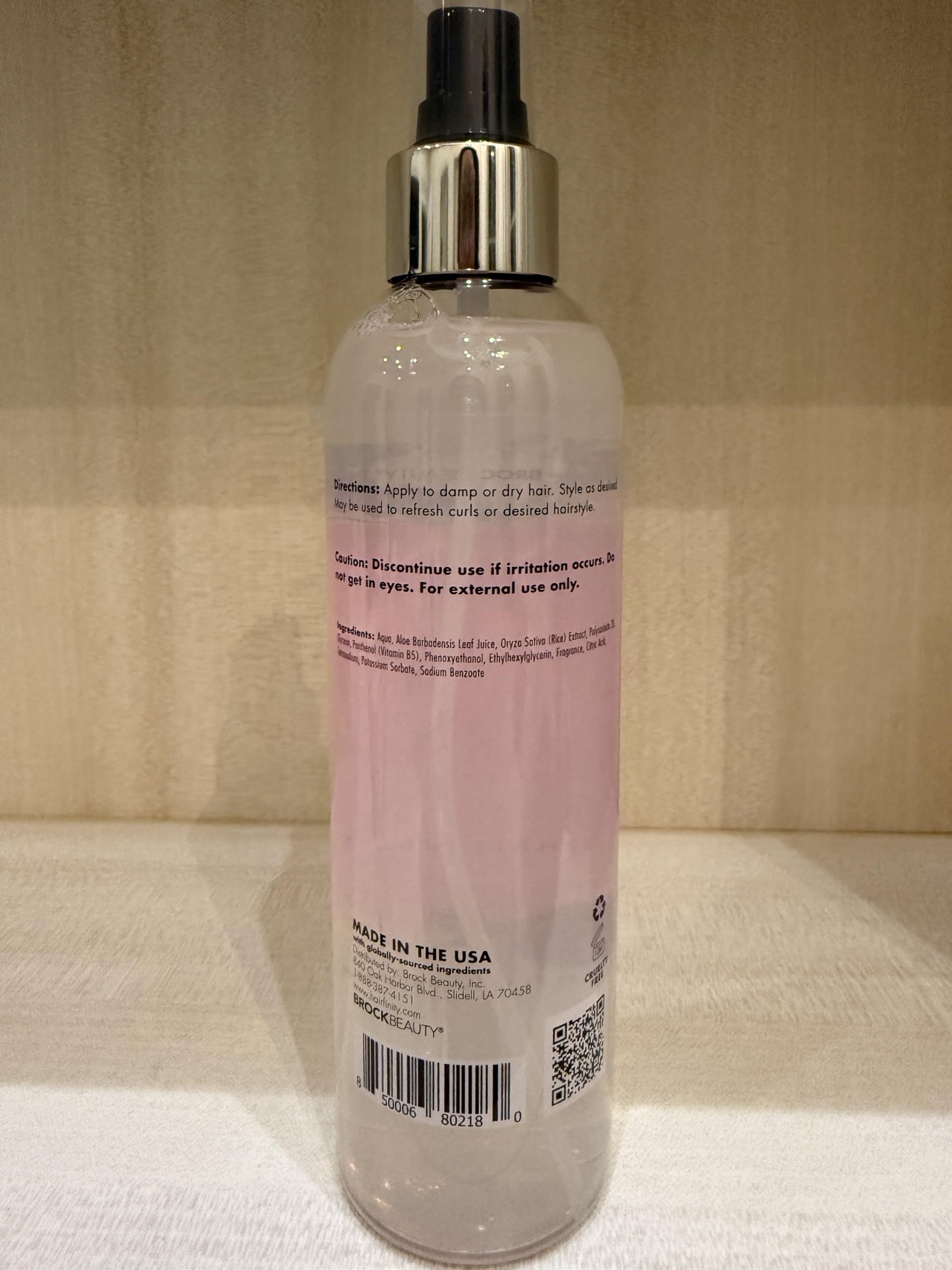 Hairfinity Rice Water Hair Mist, envase de 236 ml, práctico para retoques y viajes.
