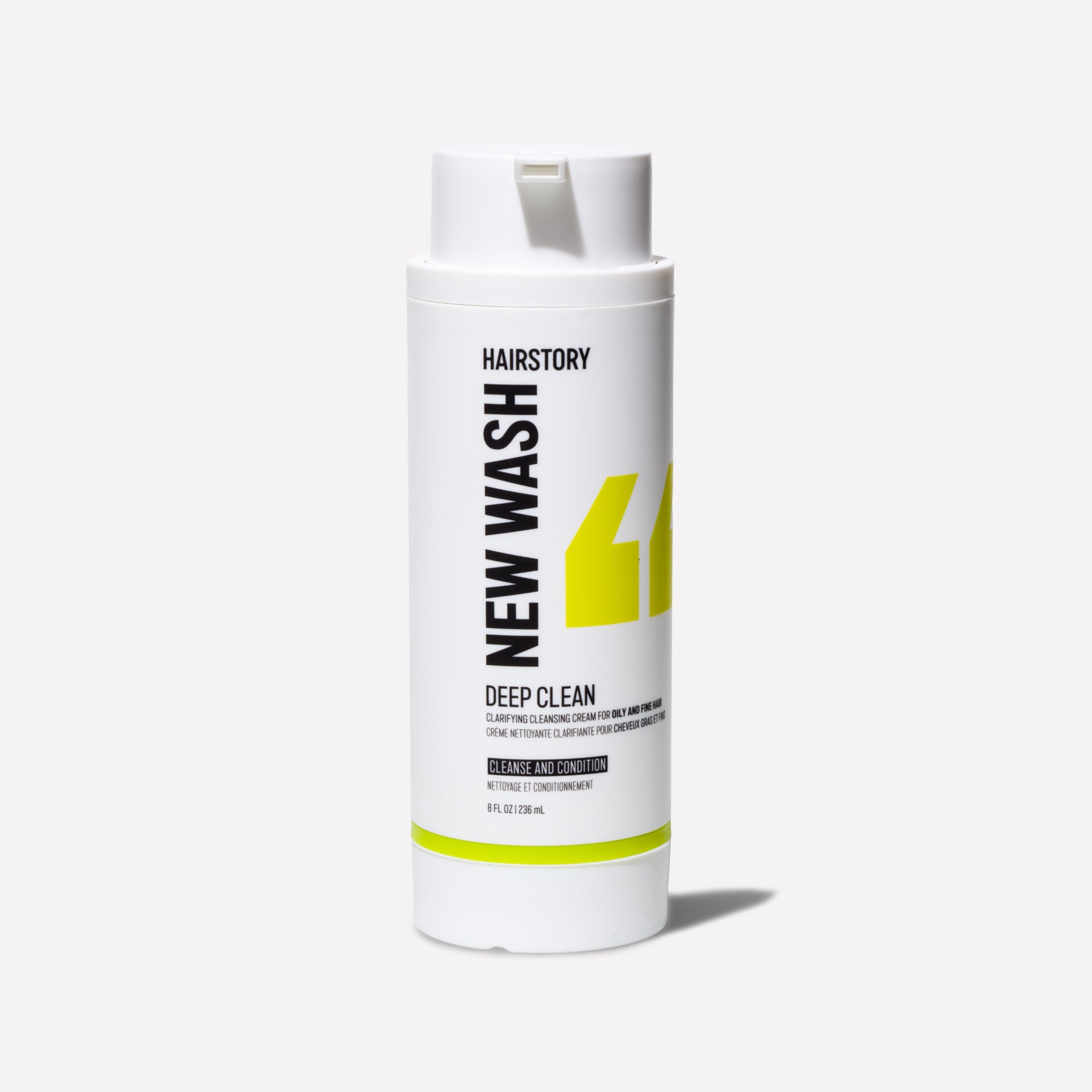 Hairstory New Wash Deep Clean bottle pours to cleanse hair without detergents