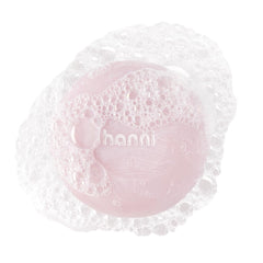 HANNI Cocoon Cleanse Serum: botella elegante para cuidado diario.