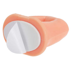 Hedume dedo de práctica con superficie texturizada para mejor adherencia del esmalte.