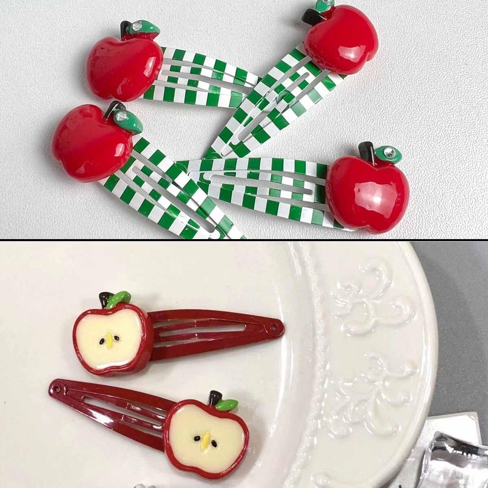 Clip de pelo Manzana Roja de Heogacinlia con hojas verdes para estilismo suave.