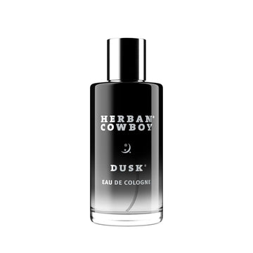 Herban Cowboy Dusk: botella de colonia con notas terrosas para uso diario