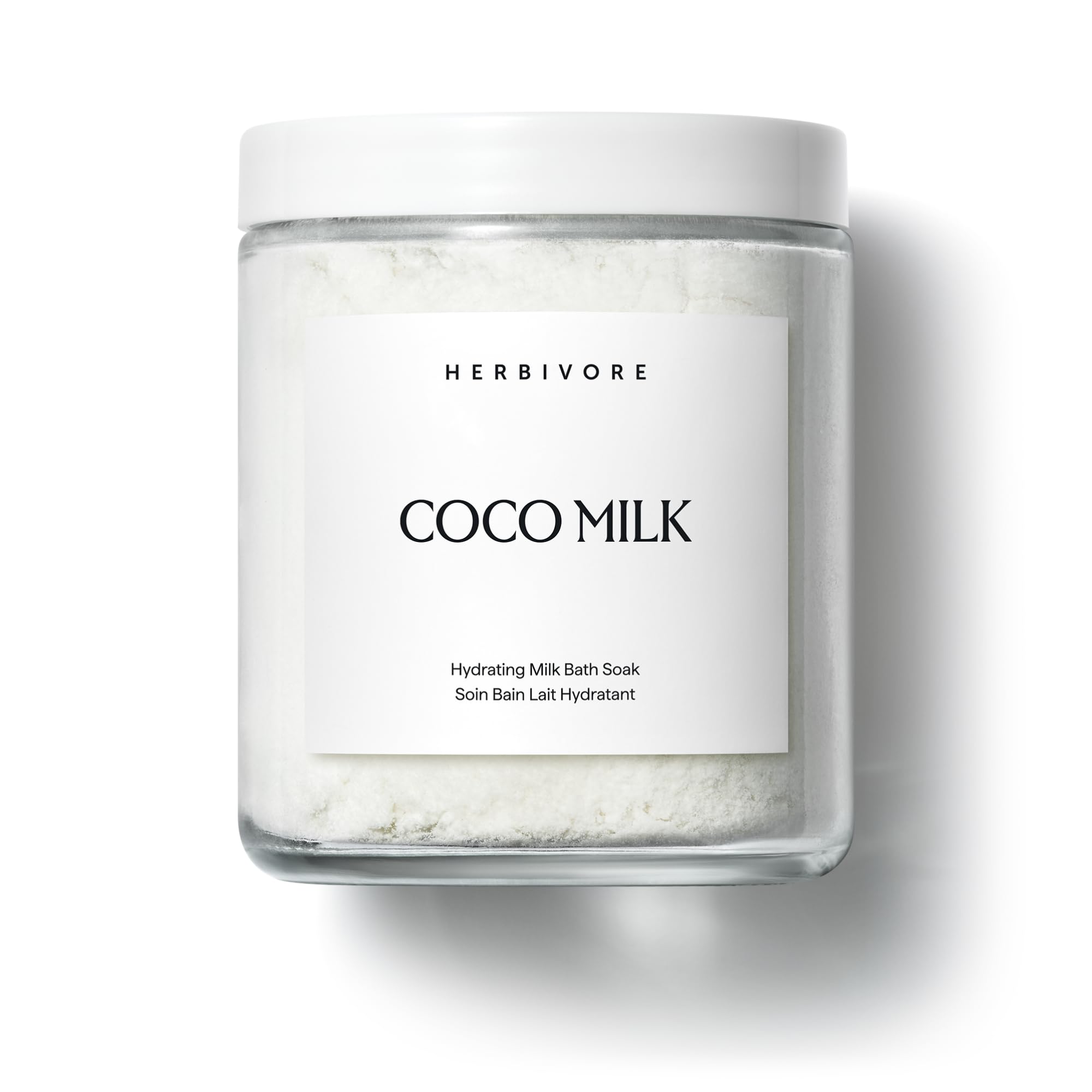 HERBIVORE Leche de Coco para baño, botella enfatiza hidratación profunda para la piel.