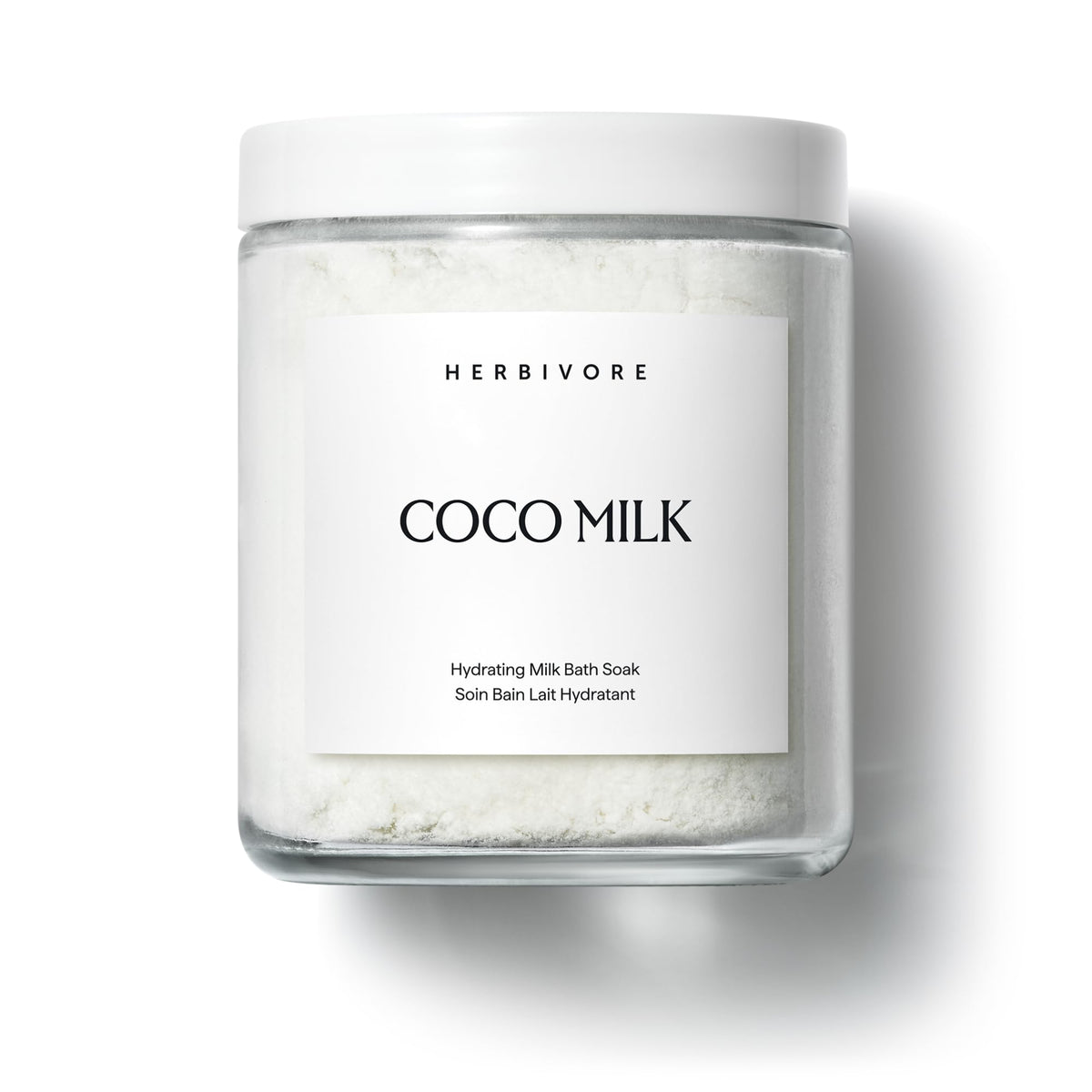 HERBIVORE Leche de Coco para baño, botella enfatiza hidratación profunda para la piel.