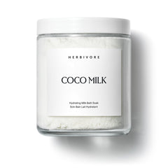 HERBIVORE Leche de Coco para baño, botella enfatiza hidratación profunda para la piel.