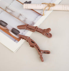 Pinza HH&LL para seccionar el cabello durante el peinado