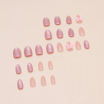 Hkanlre uñas falsas en almendra rosa, ideal para eventos.