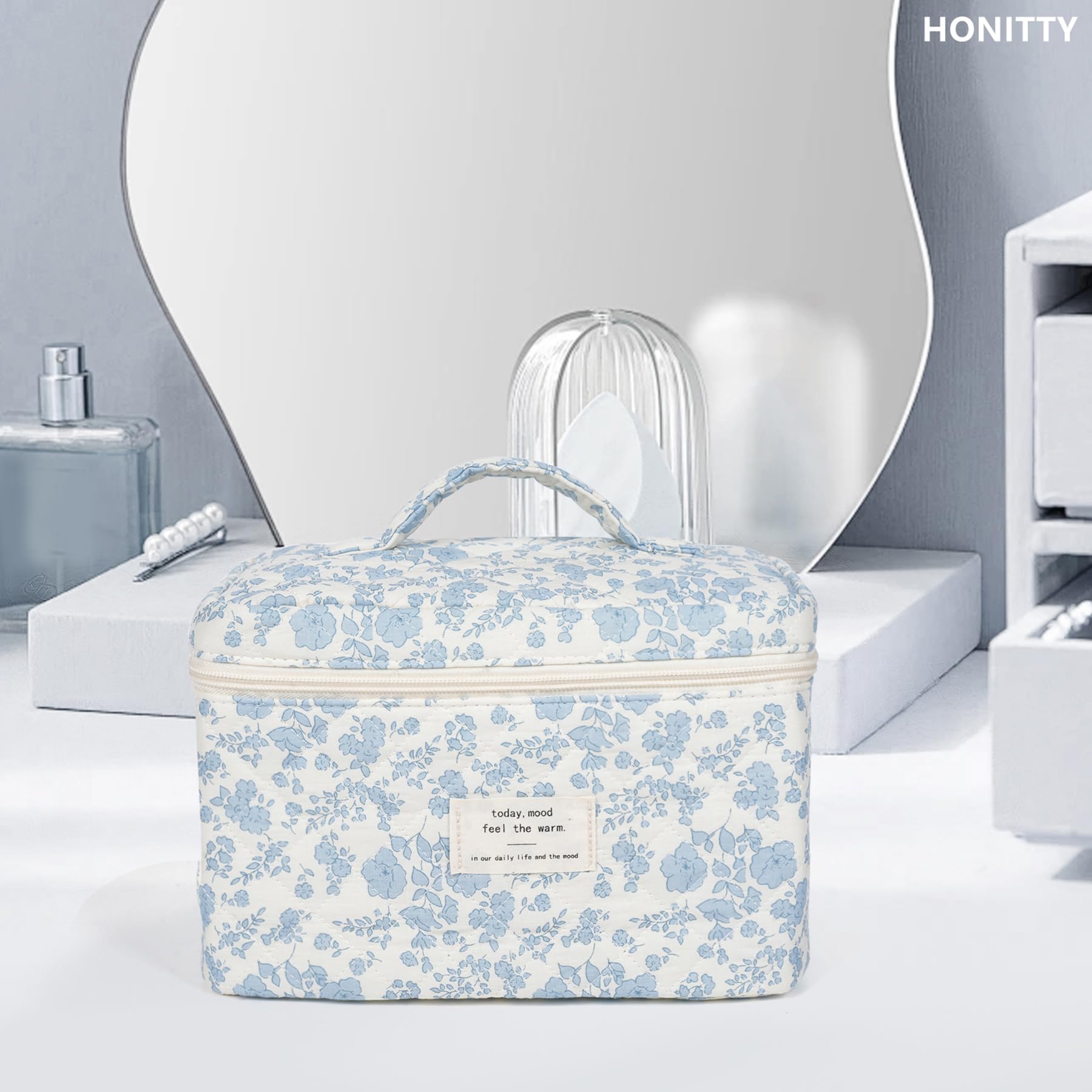 Honitty bolsa maquillaje uso diario, diseño acolchado para estilo y organización.