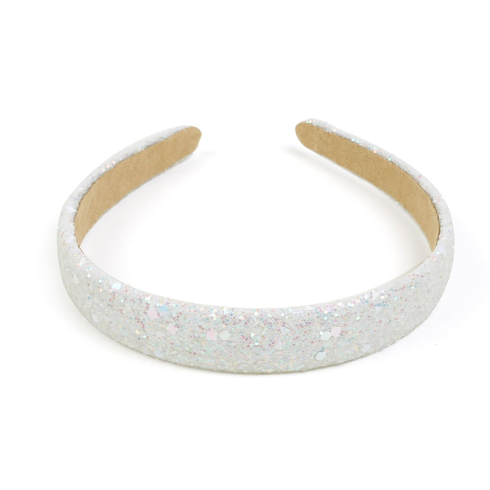 Huachi diadema con brillos rosa vivo, aporta color y estilo a cualquier atuendo.