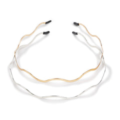Diadema Huachi en plata con diseño en onda, ideal para atuendos casuales.