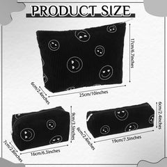 Neceser Huhumy de pana negro con sonrisa, ideal para cosméticos y accesorios pequeños.