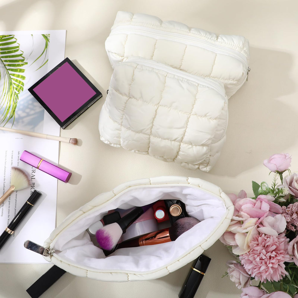 Organizador de viaje Huhumy acolchado para maquillaje y aseo.