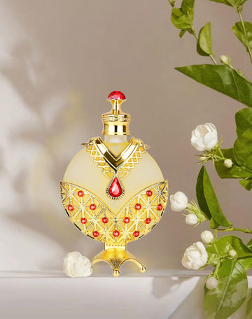 Huibao Gold Arabian perfume oil bottle close-up shows amber glass and quality notes.