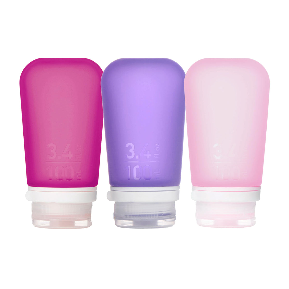 humangear GoToob+ botella rosada para viaje, ideal para líquidos de aseo en cabina.