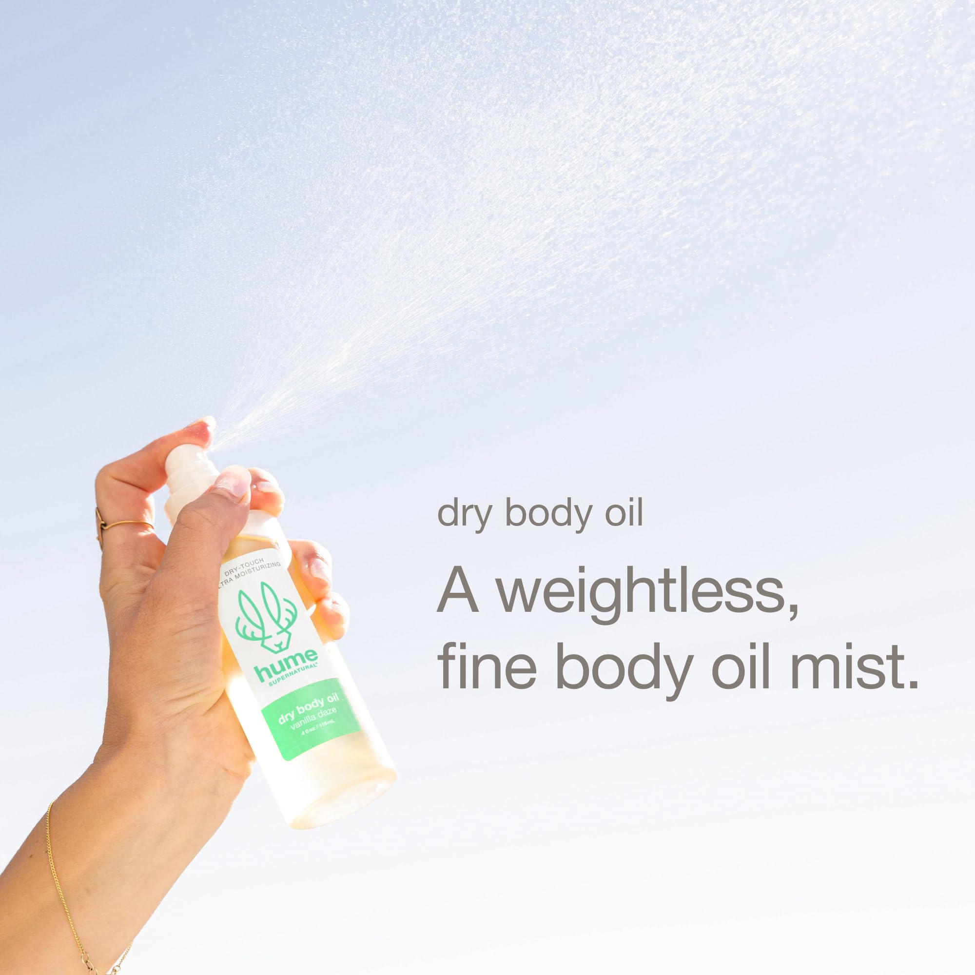 HUME SUPERNATURAL Dry Body Oil Spray shows easy post shower use with quick rub in.