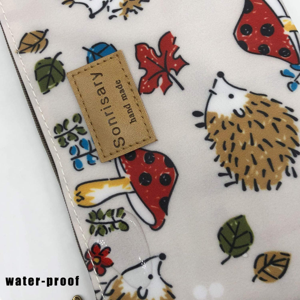 Estuche de maquillaje Hunger erizo estampado, ideal para viajes cortos y organización.