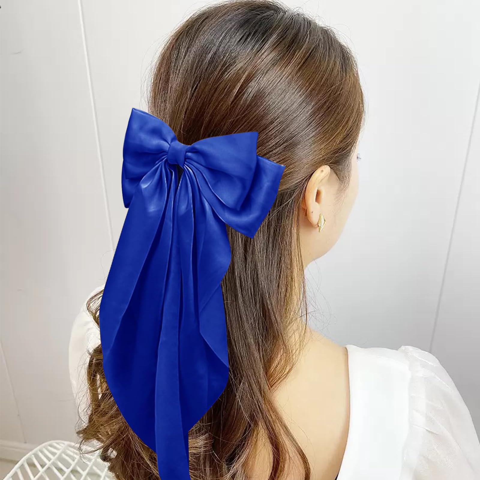 illpta pinzas lazo grande satinado, sujetan el cabello con estilo y firmeza.