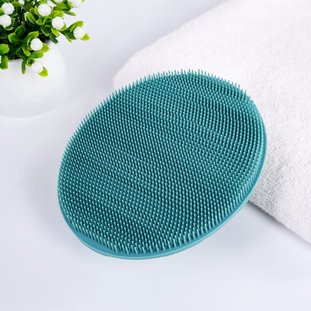 INNERNEED brush with non-slip handle clip for secure grip during shower.
