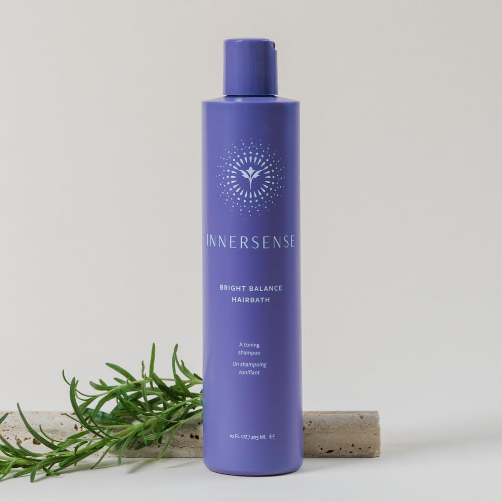 INNERSENSE Balance púrpura Hairbath, envase frente a la luz, realza color y vitalidad.
