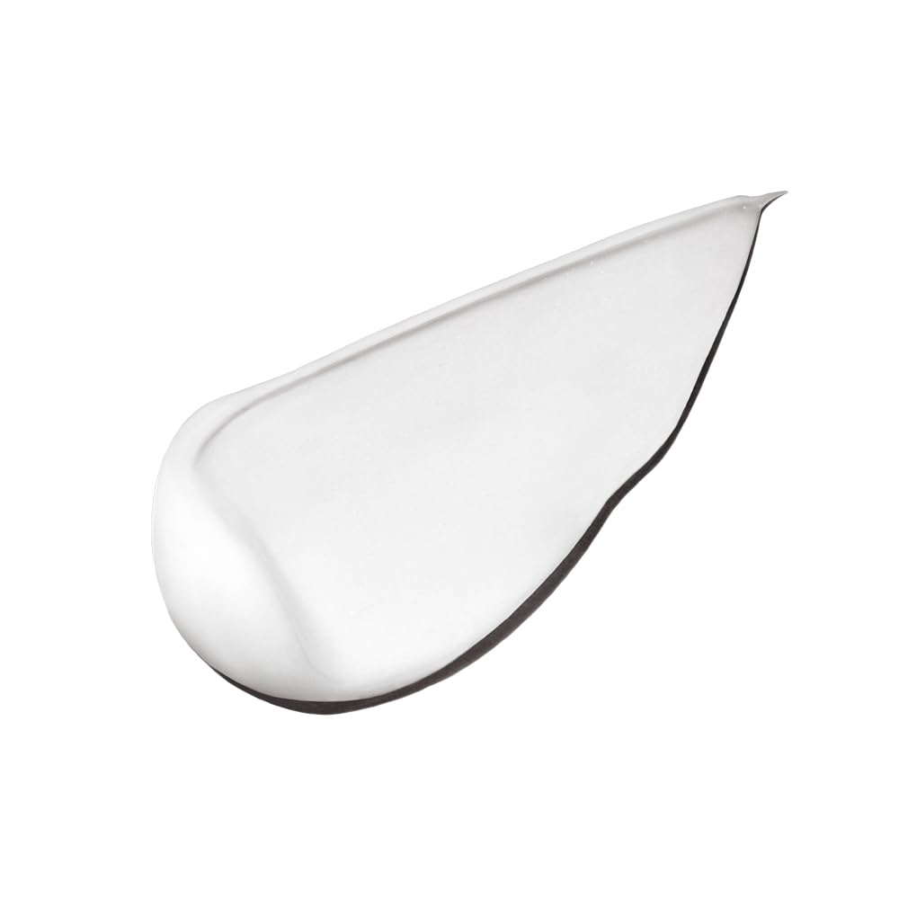 INNERSENSE Organic Beauty Radiancia Natural Condicionador vertido en mano: textura cremosa lista para uso diario.