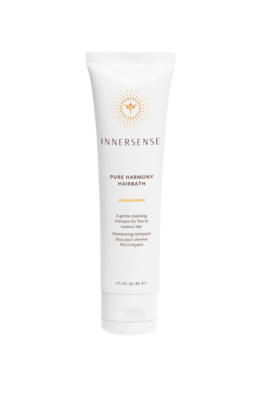 La botella de acondicionador INNERSENSE Pure Harmony suaviza y desenreda con ligereza.
