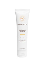 La botella de acondicionador INNERSENSE Pure Harmony suaviza y desenreda con ligereza.