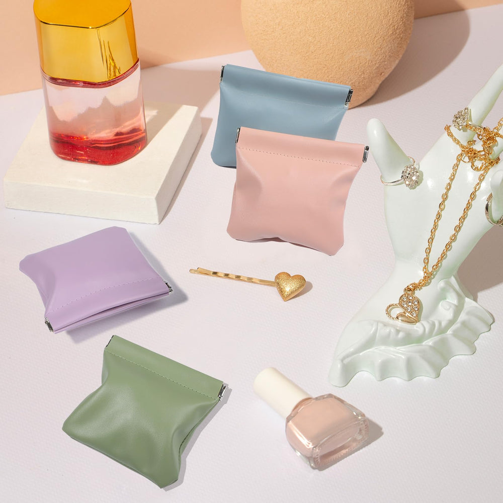Pouchic ISKYBOB: bolsa de piel para joyas y maquillaje en bolso.
