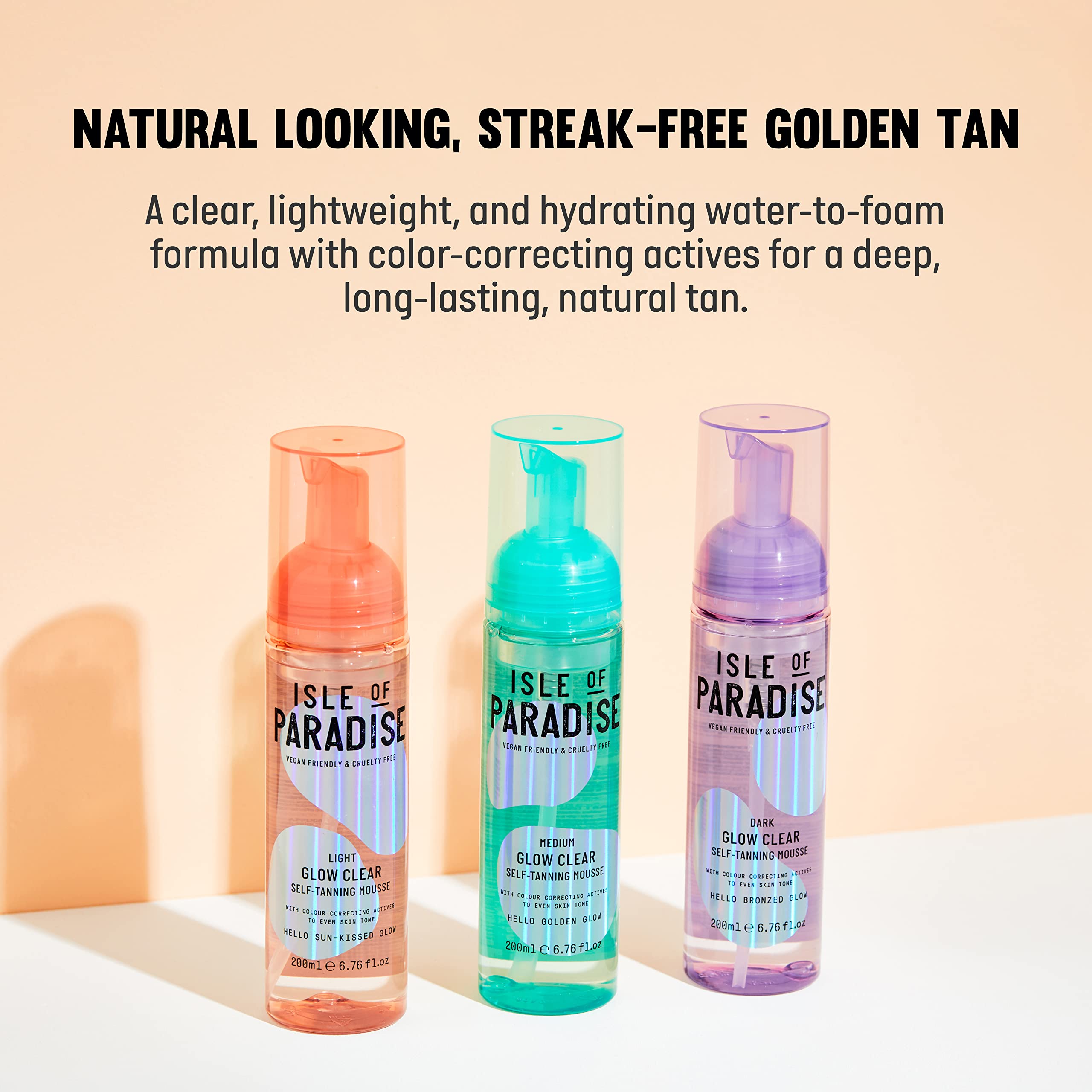 Isle of Paradise Glow Clear Mousse – effet bronze violet offrant un teint uniforme.