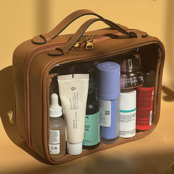 JAZD neceser transparente con doble compartimento para organizar cosméticos y accesorios.