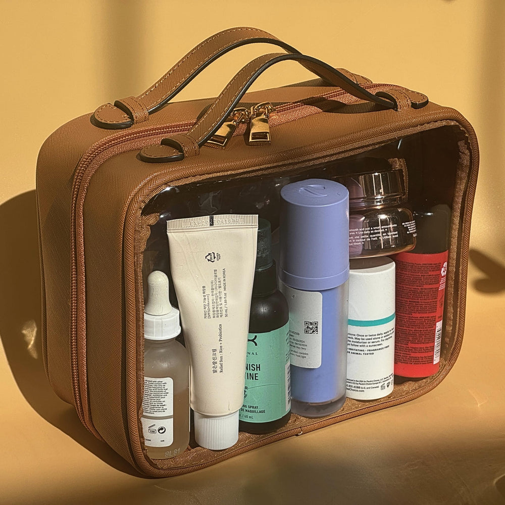 JAZD neceser transparente con doble compartimento para organizar cosméticos y accesorios.