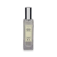 Jo Malone Flor de Albaricoque y Miel, envase de lujo con etiqueta.