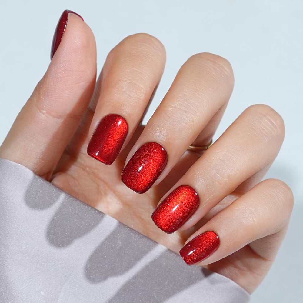 Uñas Jofay Fashion rojas cortas con efecto ojo-gato para un look elegante diario