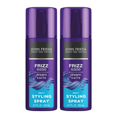 John Frieda Dream Curls spray: aplicación diaria para rizos definidos y brillantes.