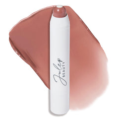 Bálsamo labial Julep en tono malva antiguo para color duradero.