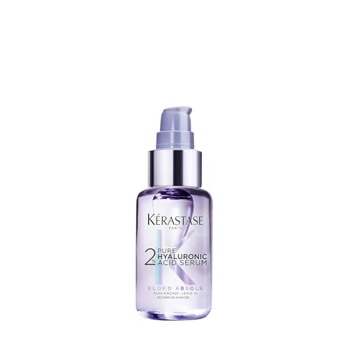 Aplicación del Kerastase Blond Absolu Serum sobre cabello mojado para suavidad y nutrición.