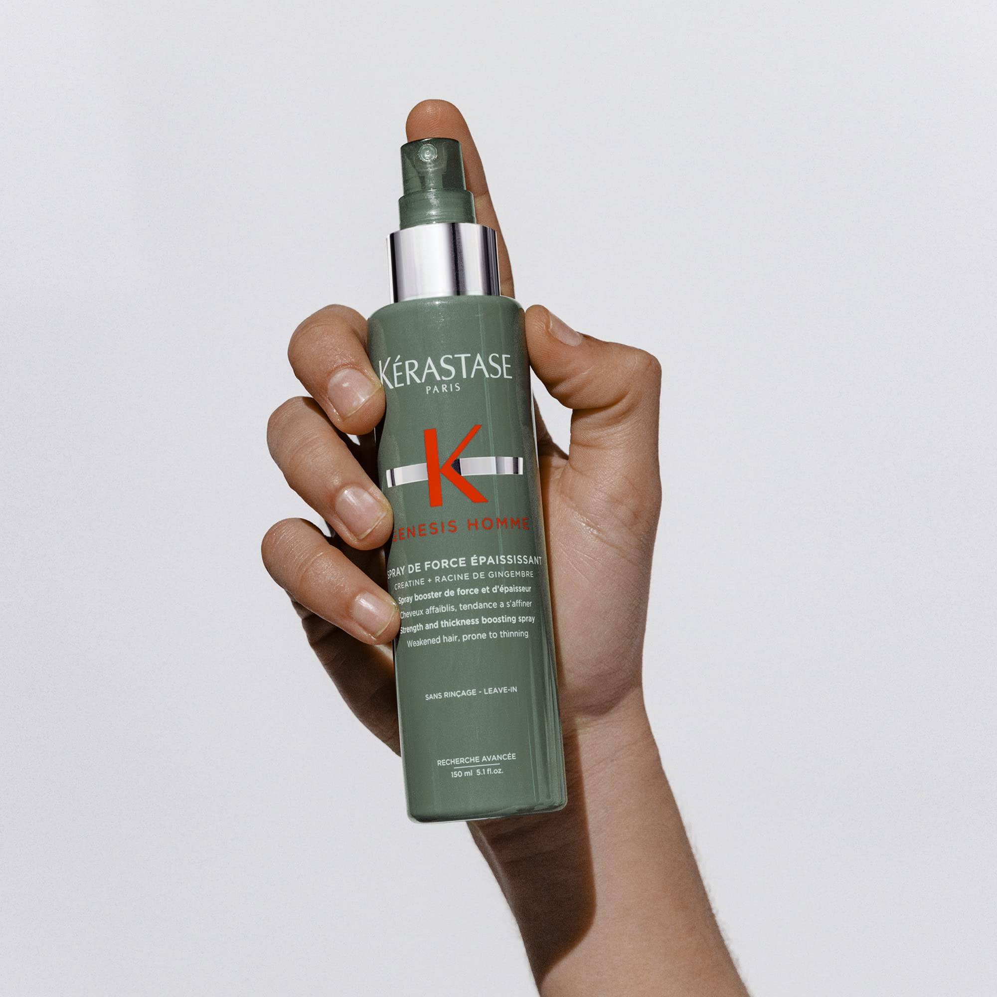 KÉRASTASE Genesis Homme, frasco de presentación elegante para baño.