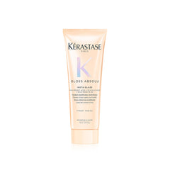 KÉRASTASE Gloss Absolu, botella derramando, brillo inmediato y desenredo suave