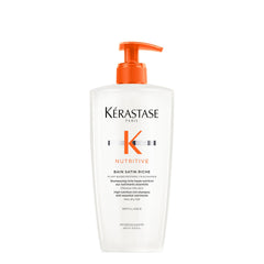 Kerastase Nutritive Bain Satin Riche: botella vertiendo, limpieza suave y nutrición inicial.
