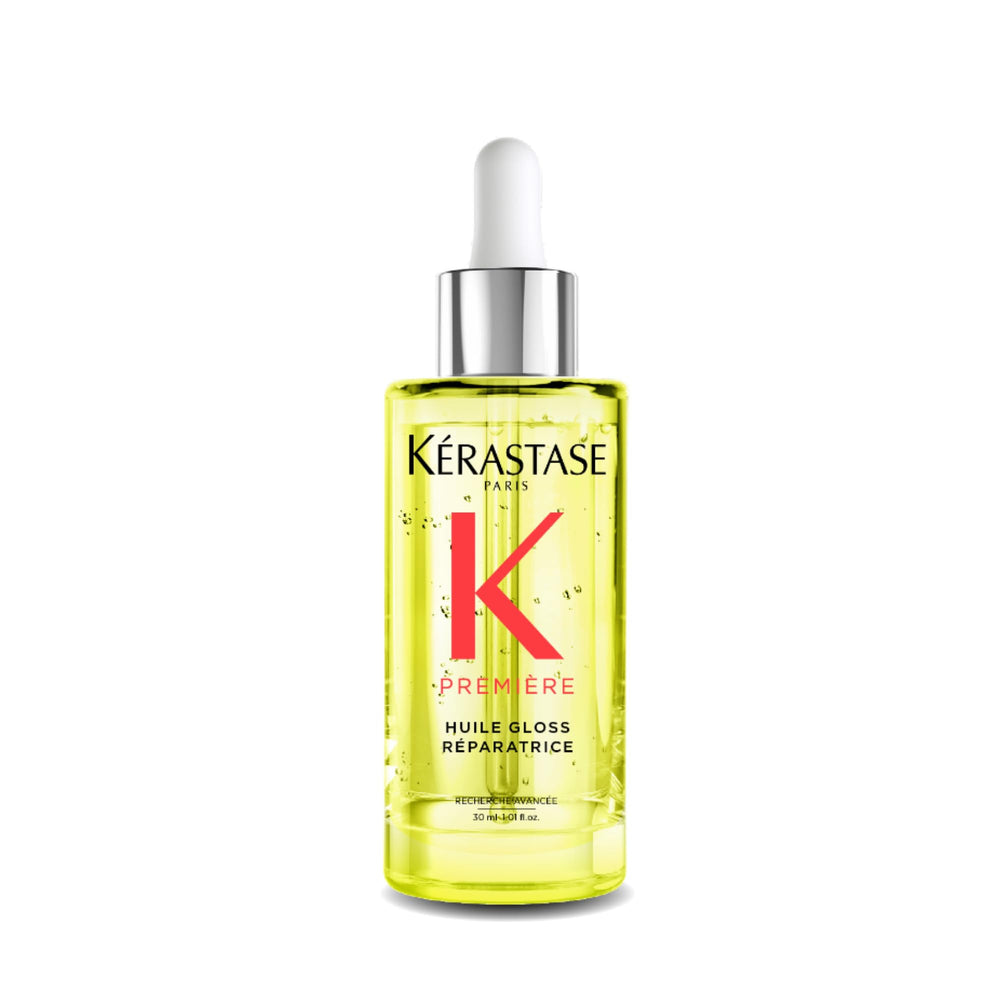 KÉRASTASE Première Aceite Reparador, botella para protección térmica y brillo duradero.
