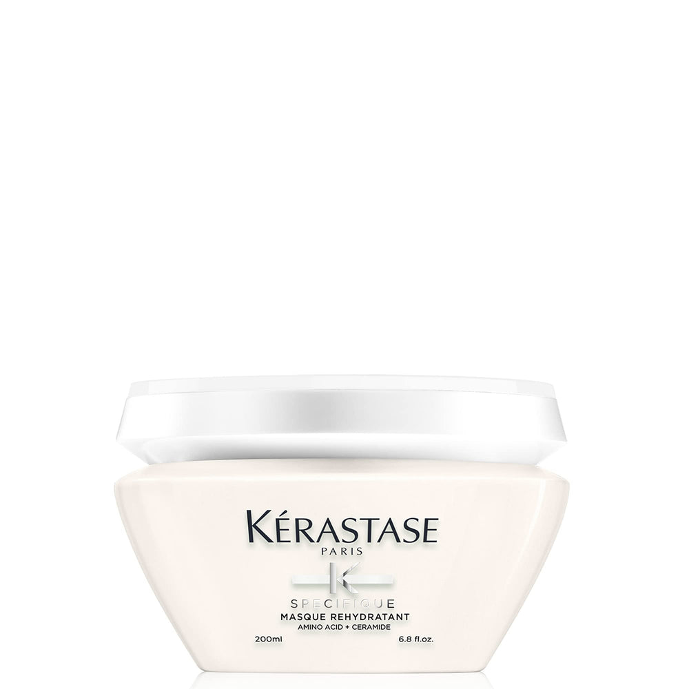 Kérastase Specifique Rehidratante en botella, facilita desenredar y revitaliza el cabello.