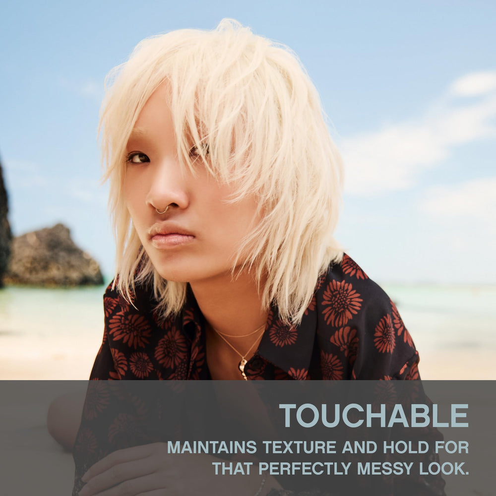 Closeup of Kevin.Murphy TOUCHABLE detailing flexible hold and texture in hair.
